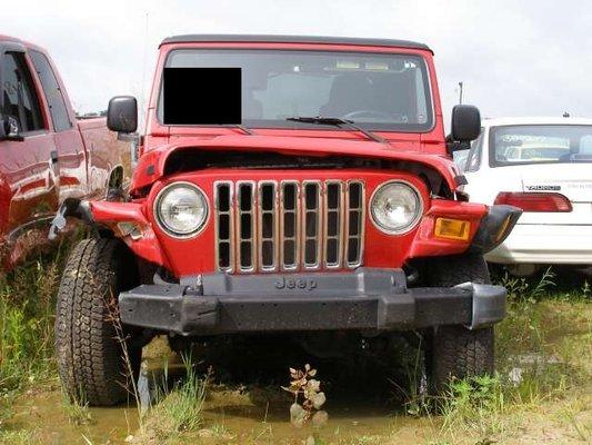 There is very little damage to this jeep from this 73 y/o's wreck.  No treatment and no recovery.  Driver died in crash.