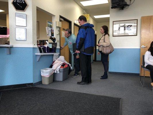 Tuesday, March 26, 2019: front room: administrator and two volunteers.