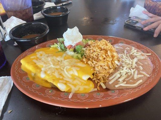 Cheese enchiladas with queso.