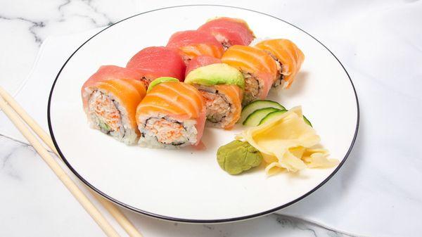 Rainbow Roll: Salmon, Tuna, and Avocado on top California roll