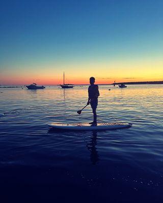 Sunset paddle board tour