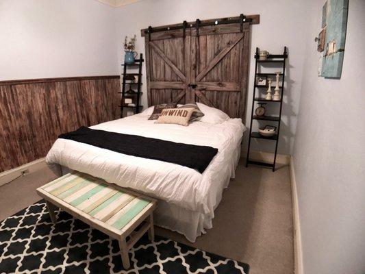 The Farmhouse room has my favorite wood accents, including these great barn doors.