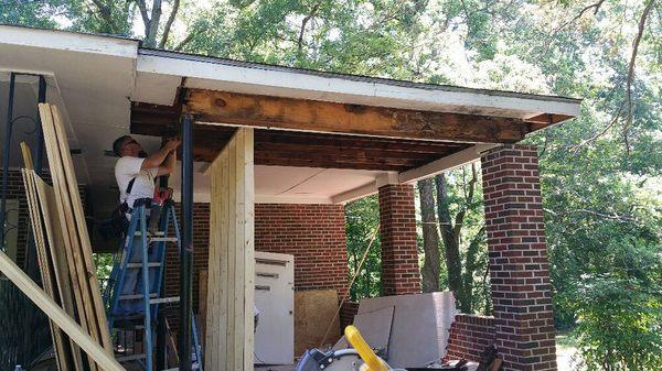 Rebuilding of support beams and trim on a carport