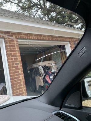 Windshield cracked in garage over Christmas cold weather.