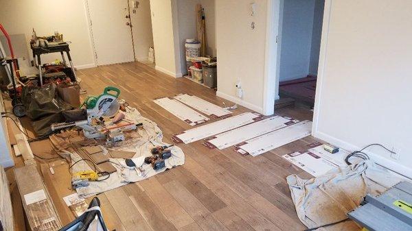 Laminate flooring installed throughout the condo