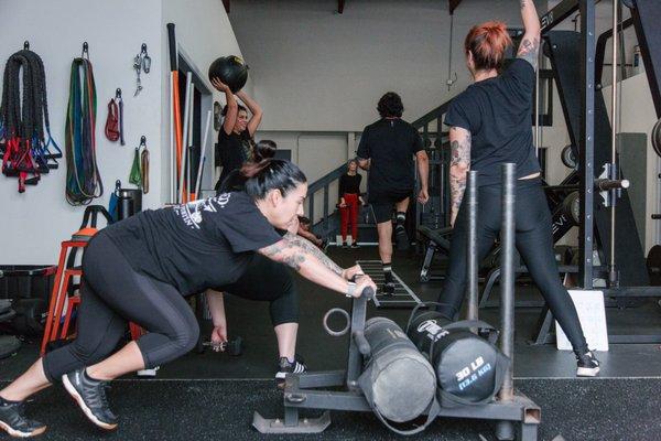 Boot camp exercise, sled push