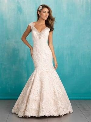 Favorite details of this gown include the delicately beaded cap sleeves and tiered lace train. || Allure 9311 (Available in w...