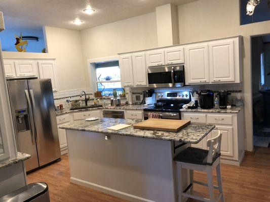 New kitchen from cabinet reface, granite, backsplash, new soft close hardware, door hardware, and pull out shelves.