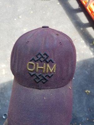 One of our OHM hats well-worn from work well done.