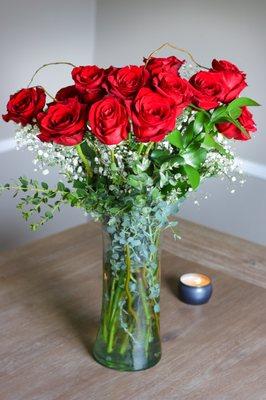 One dozen freedom red roses.