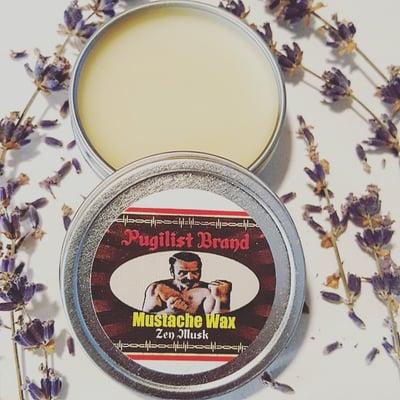 Pugilist Brand Mustache Wax for handlebar mustaches.  Choose from 4 natural scents at www.pugilistbrand.com