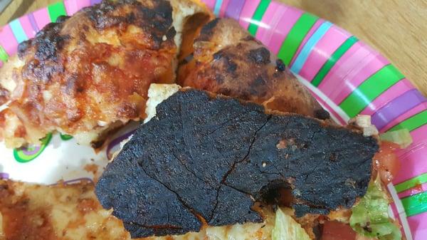 This was our disgusting burned pizza.