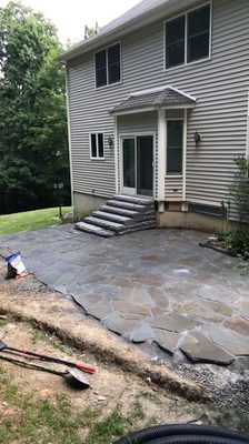 After. Bluestone patio. And Cambridge cast stone steps