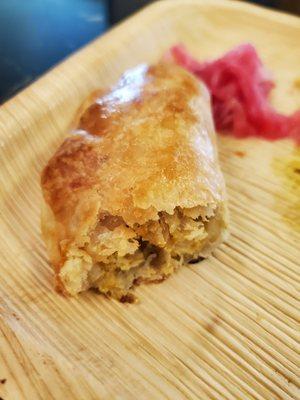 Chicken inside the Aji De Gallina empanada