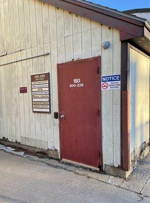 Entrance to the stairs (across from the entrance to the elevator).