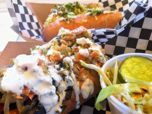 Sonora dog (bacon, pinto beans, rajas jalapeno relish and crema); Capitol Hill dog (cream cheese wasabi slaw caramelized onions nori sesame)