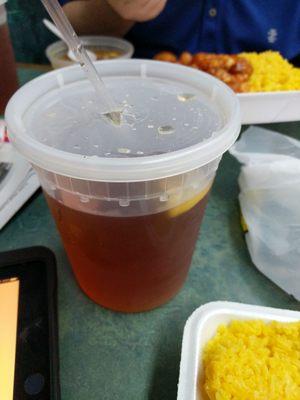 Sweet tea in large container.