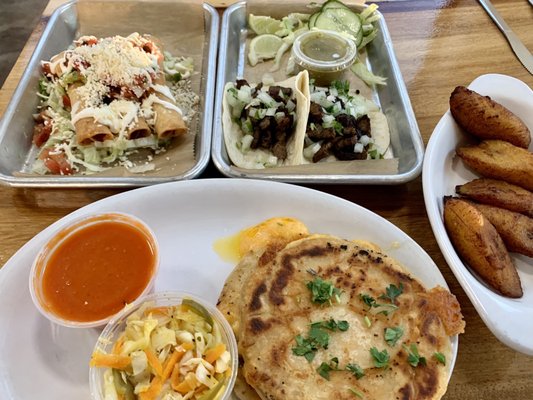 Taquitos, Carne Asada Tacos, Maduros, and Cheese pupusas - yummy!