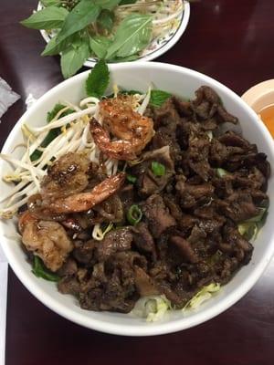 Charbroiled pork with rice vermicelli. Added shrimp.