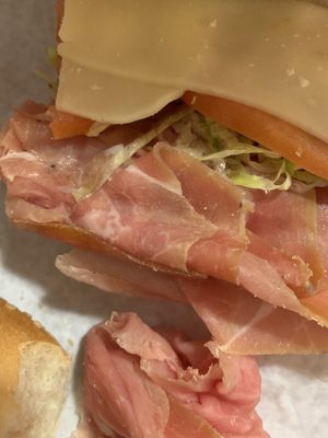 Bad ends of prosciutto. Utterly confused as to why there is a picture of a good looking prosciutto sub and I get this