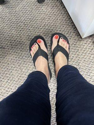 Pedicure with black accent nail