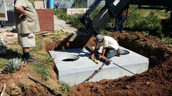 septic tank being installed