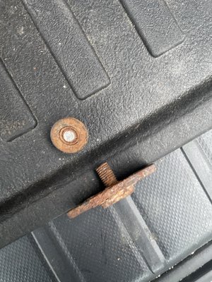 Sheered bolt to battery tie down after attempting to unscrew the nut.