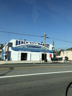 Front of market/laundry/deli. .