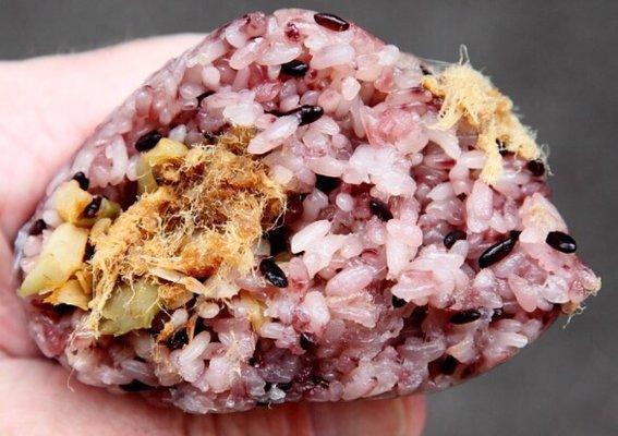 Dried pork in purple sticky rice.