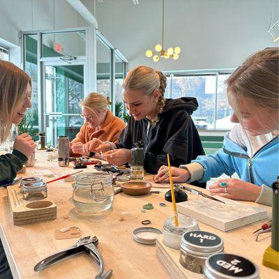 Making jewelry at Studio SLVR during a silversmith workshop