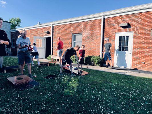 People in the corn hole tournament.