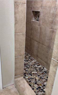 This is the completed 4'x8' shower with dual heads. 17" square tile on a straight layout flowing with the remodeled bathroom floor