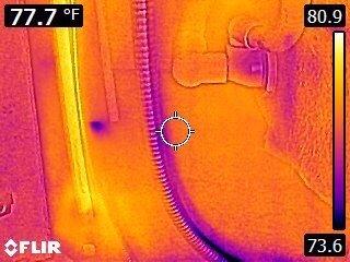 In this infrared picture we find that the faucet is dripping a small amount of water.