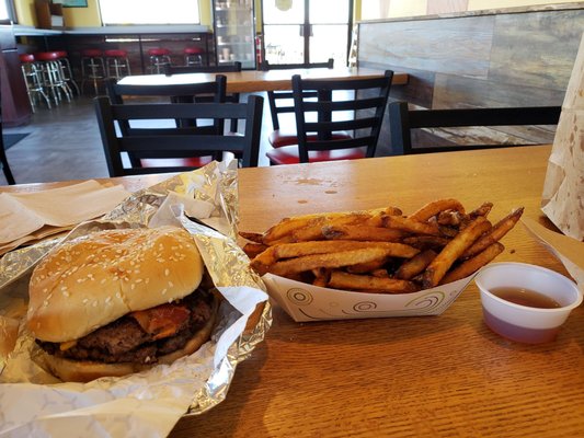 Double bacon Cheeseburger and sea salt fries.  To go homemade ice cream cooler in background.