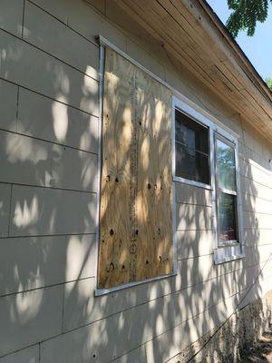 Emergency window board up for a landlord.