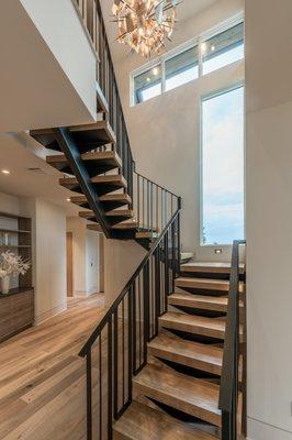 Open riser stair at 7 Oaks Residence