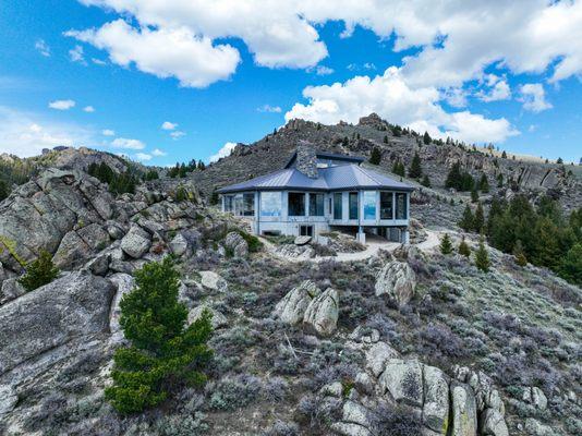 Perched on a granite promontory in the Revenue Rocks of McAllister, Montana