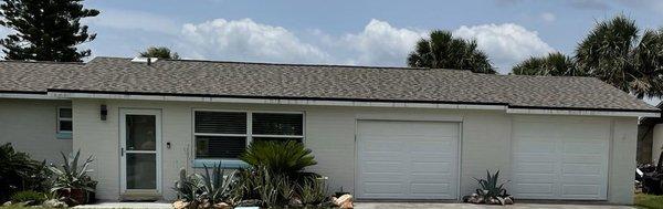 OUR BEAUTIFUL FINISHED ROOF. THE GUTTERS ARE ON THE BACK OF THE HOUSE, BUT I DON'T HAVE A PHOTO OF THAT.