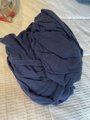 Folded fitted sheet