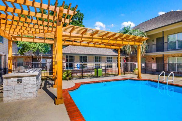 Poolside at The Heritage at Hillcrest apartments in Austin, TX