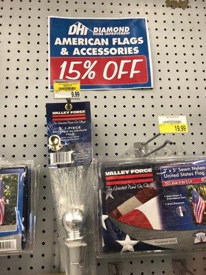 15% off sign on end cap for flags before manager took it down.