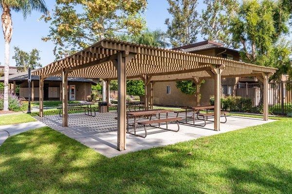 Casa Sierra's courtyard features leisurely walking paths and picnic tables for residents to enjoy the fresh air!