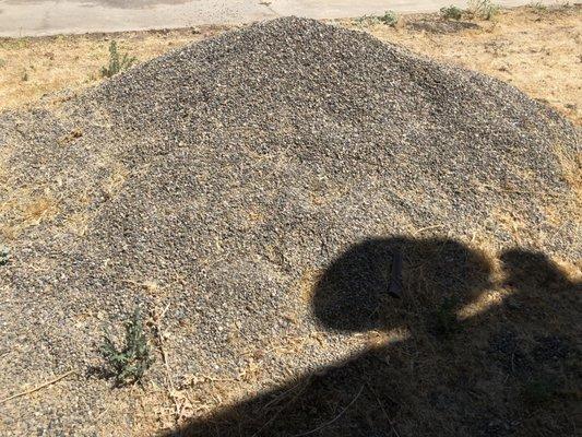 The pile of grave needed to be mover to a different location on the property