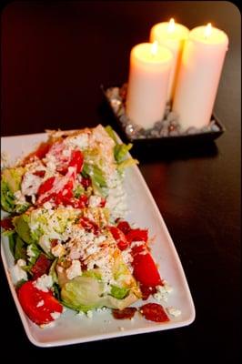 Iceberg Wedge Lettuce Salad with Roasted and Sundried Tomatoes, Crumbled and Blue Cheese Dressing and Bacon .... YUM!