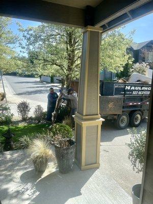 Hot tub being hauled away.