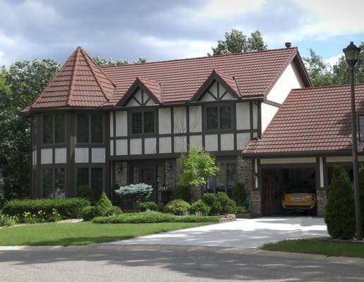 This home is stucco and went with a classic tile look. The color is Spanish Red and gives the home the old world look.