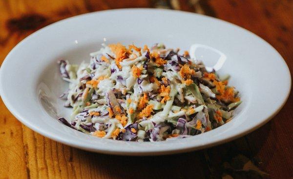 COLESLAW SALAD $13
Green and red cabbage, carrots and our home made honey mayo sauce