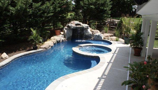 Freeform pool with spa and waterfall