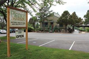 Outside shot of Plenty Pharma with its own parking lot and handicapped accessible ramp.