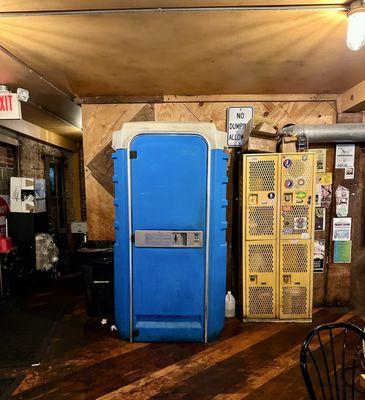 Bathroom at DT Kirby's. Looks like a porta-potty but opens into an actual bathroom. LOL!